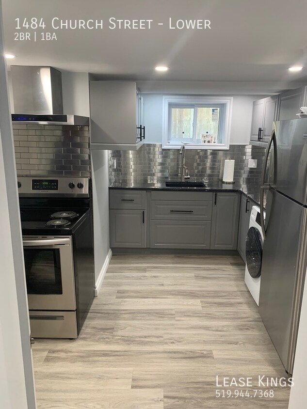 Primary Photo - 2 Bedroom 1 Bathroom Lower Unit DONE TO TH...