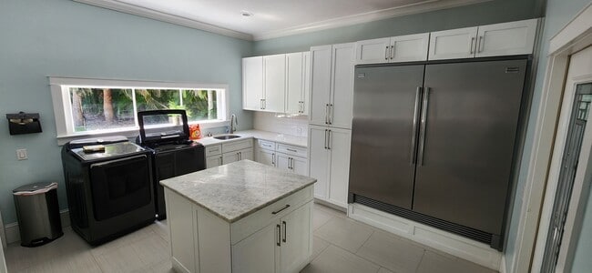 Laundry room - 1066 SE Saint Lucie Blvd