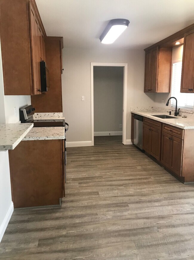 Building Photo - BEAUTIFUL REMODELED CORNER DUPLEX WITH GAR...
