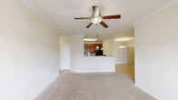 Located at 101 Halehaven Dr in Duncan, SC, this single-floor, 3-bedroom, 2-bathroom home offers a practical and comfortable layout designed for everyday living. The neutral, warm-toned walls and plush carpeting throughout the bedrooms create a calm, cohesive aesthetic that runs through the entire residence.

The generously sized primary bedroom serves as a true retreat, offering ample room to furnish comfortably and featuring a pendant light fixture that adds a subtle decorative touch. The secondary bedrooms are well-proportioned, each benefiting from natural light through blinded windows and direct access to closet space, including a walk-in closet equipped with wire shelving systems for organized storage.

Both bathrooms are finished with clean, white tub-shower combinations and brushed nickel hardware, maintaining a consistent and functional style. The tile flooring in the bathrooms and laundry room contrasts neatly with the carpeted living spaces. The dedicated laundry room includes washer and dryer hookups and an overhead wire shelf, adding to the home's overall utility.

Throughout the home, clean white trim, panel-style doors, and light-toned walls contribute to a bright, move-in-ready atmosphere. The floor plan, visible in the dollhouse view, reflects a well-organized layout with efficient use of space across all rooms.
