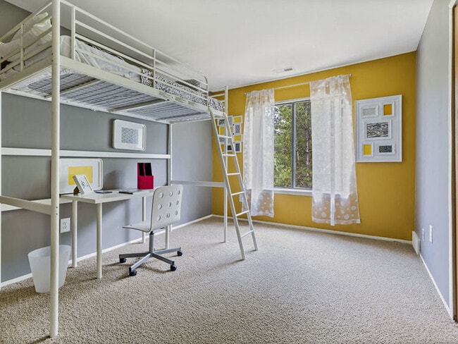 Airy bedroom with natural light at Franklin River Apartments in Southfield, MI - Franklin River Apartments