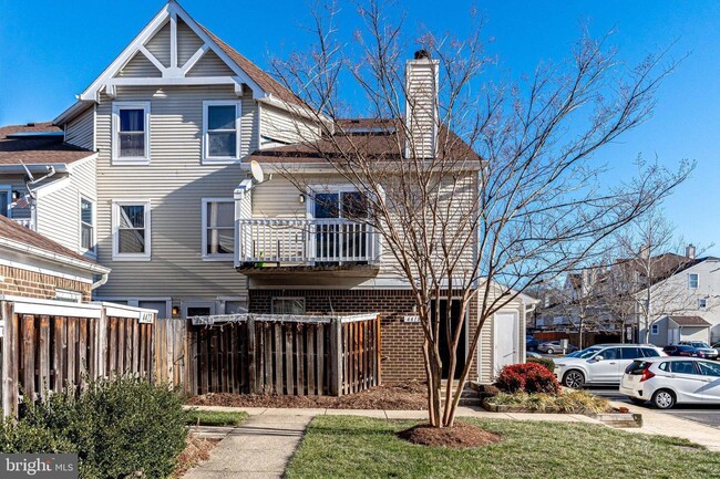 Building Photo - This two-bedroom, two-bathroom condo becko...