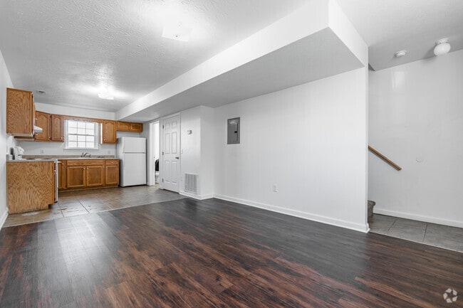 2BR, 1.5BA - 850SF - Living Room - Embassy Townhomes