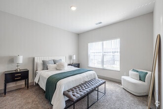 2BR, 2BA - 1,087SF - The Shoreline - Primary Bedroom - Mona Shores Flats