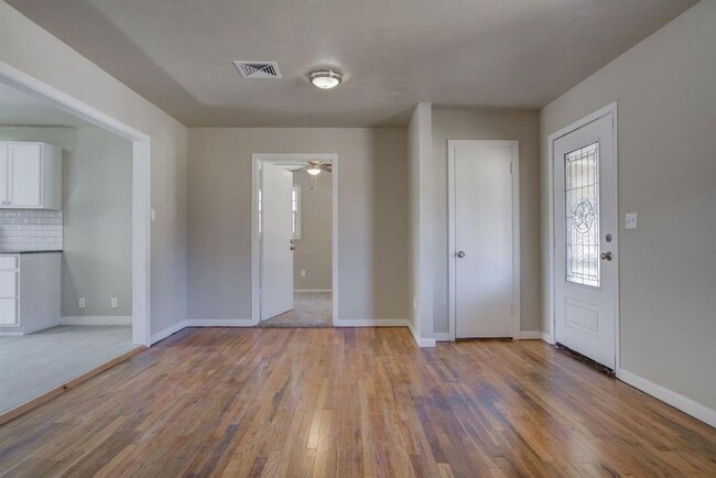 Building Photo - Spacious and Updated Four Bedroom Three Ba...