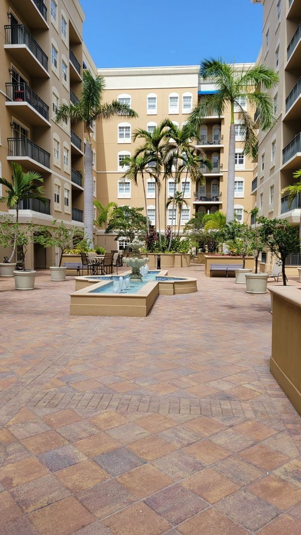 Building Photo - Annual unfurnished 2/2 top floor luxury co...