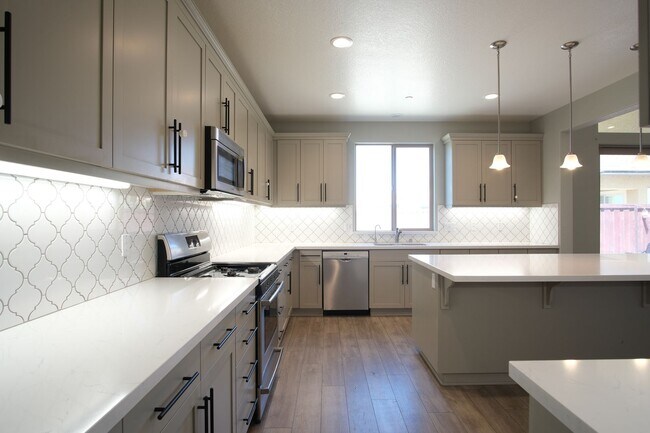 Building Photo - Available now! Beautiful Newer Home in Man...