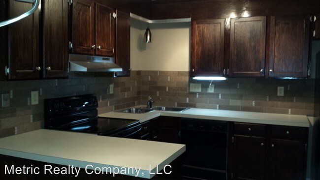 Building Photo - 8443 Coulwood Oak Ln