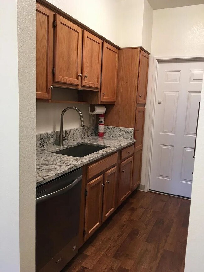 Building Photo - 2BR Condo With Attached Garage Available F...