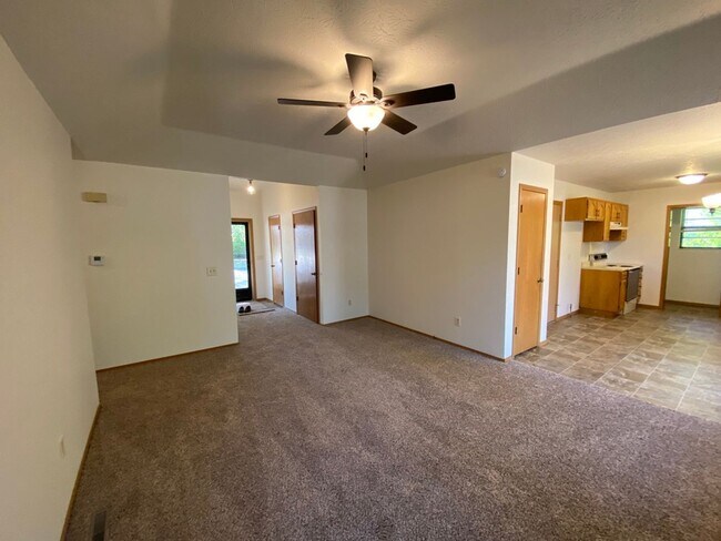 Building Photo - Three bedroom, two bathroom, two car garag...