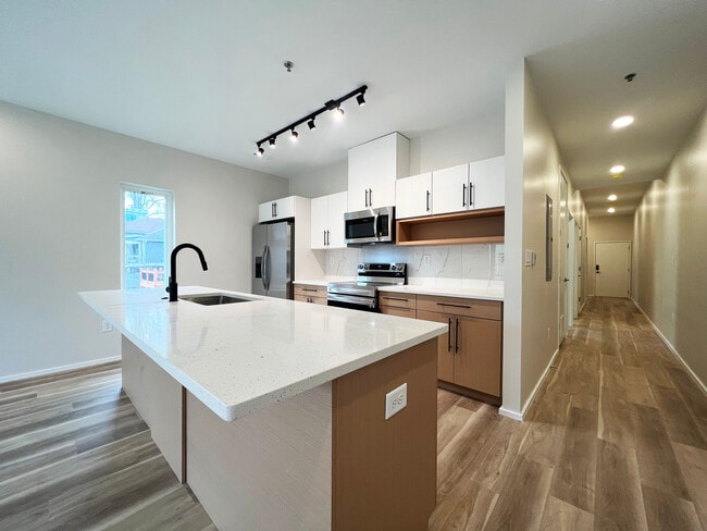 Open Floor Kitchen to Living - 547 Winton Ter NE Apartment