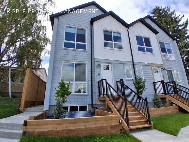 Photo du bâtiment - BRAND NEW 3-BEDROOM UPPER UNIT | BRIGHT CORNER LOT & DEDICATED GARAGE