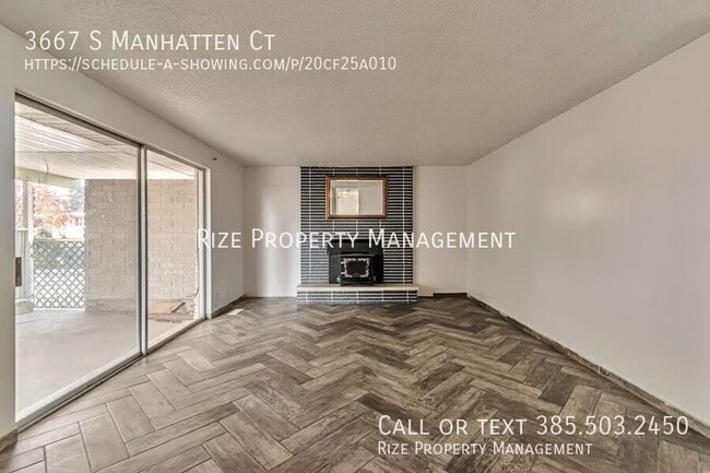 Building Photo - 3667 Manhattan Ct