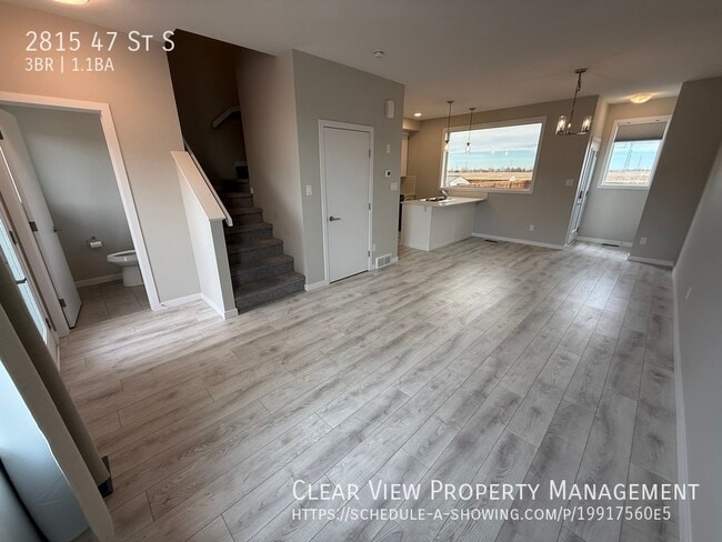 Building Photo - ? Fully fenced 3-bed, 1.5-bath townhouse in South Lethbridge with Central AC !!