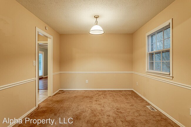 Building Photo - 3 br, 2 bath House - 128 Saturn Lane