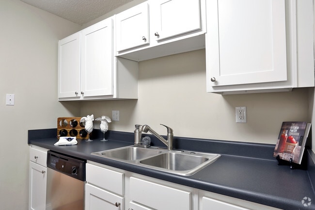 Brand New white cabinets with nickel finishes - Sterling Bluff