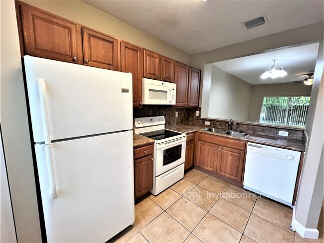 Foto del edificio - 6022 Woodlands Blvd