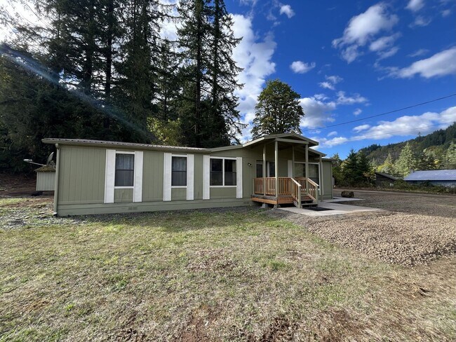 Building Photo - Charming 2-Bed, 2-Bath Country Retreat wit...