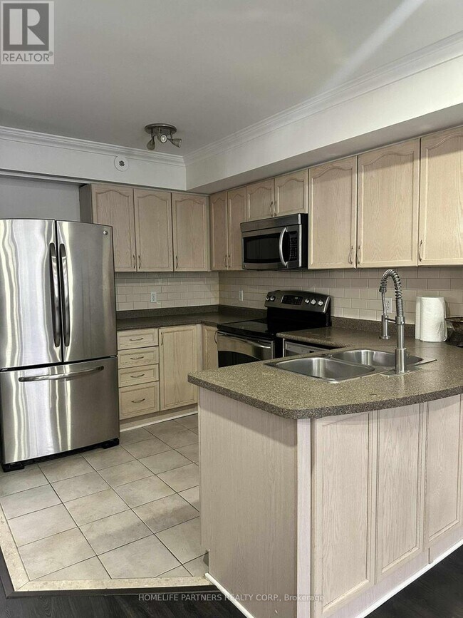 Photo du bâtiment - 605-605 Shoreline Dr