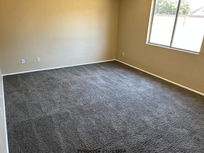Foto del edificio - "Charming 3-Bed Oasis with 2 Baths in Maricopa – Cozy 1,276 Sq Ft Haven!"