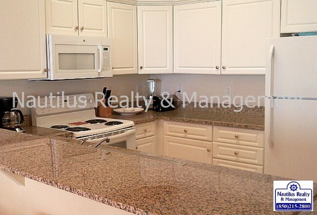 Foto del edificio - 10519 Front Beach Rd