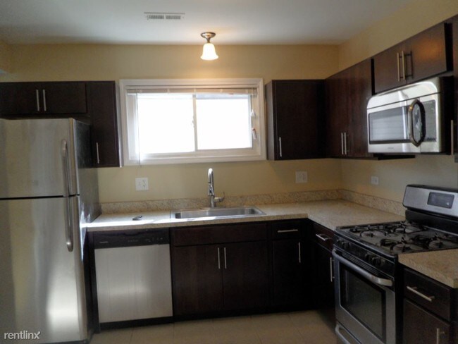 Building Photo - 3 br, 2 bath House - 4416 W Wilson Ave