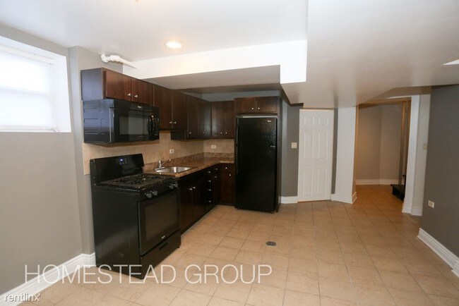 Foto del edificio - 4708 N Lowell Ave