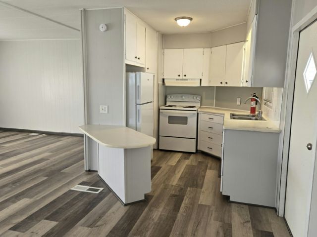 Foto del edificio - 406 50th Avenue Plaza W