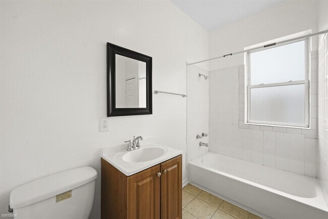 Building Photo - 3 br, 1 bath  - 6030 S Prairie Ave 3