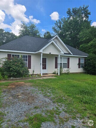 Building Photo - 7106 Windsong Way