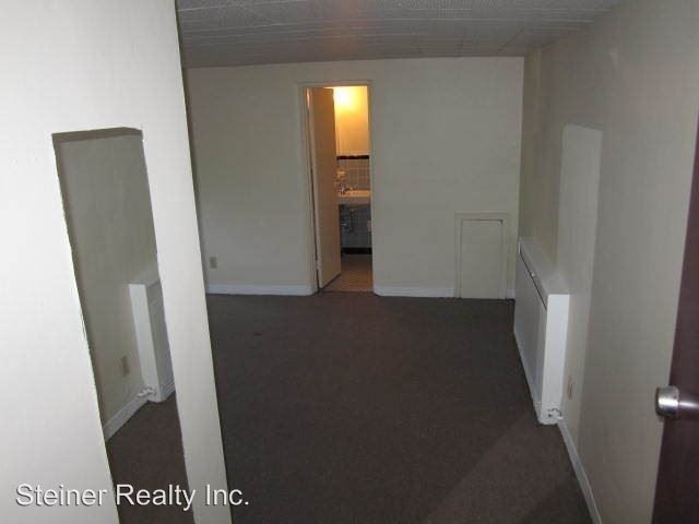 Sala de estar del apartamento tipo estudio - Lynn Apartments
