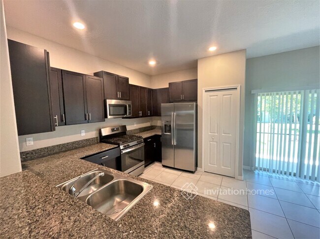Foto del edificio - 8468 Druid Oaks Ln