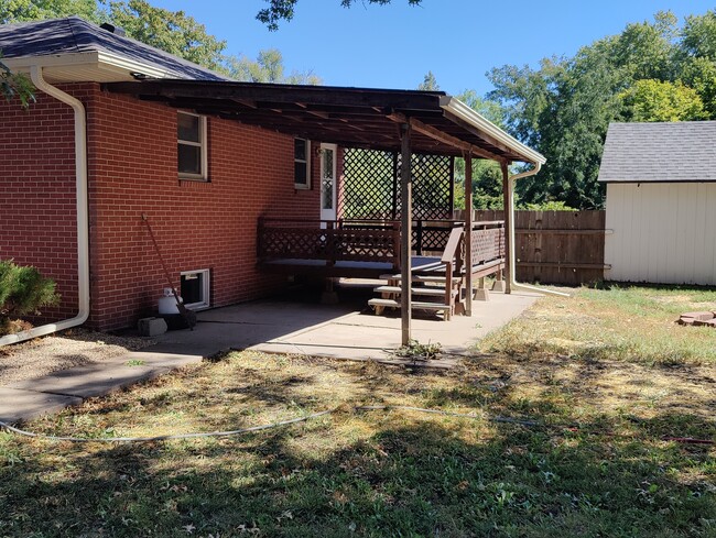 south of house, back bedroom deck - 4400 N 69th St