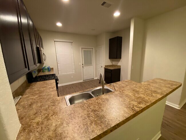 Kitchen view from dining area - 819 Salado Slough Ln