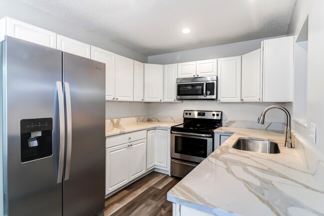 Kitchen with quartz countertops - 118 Trenholm Dr