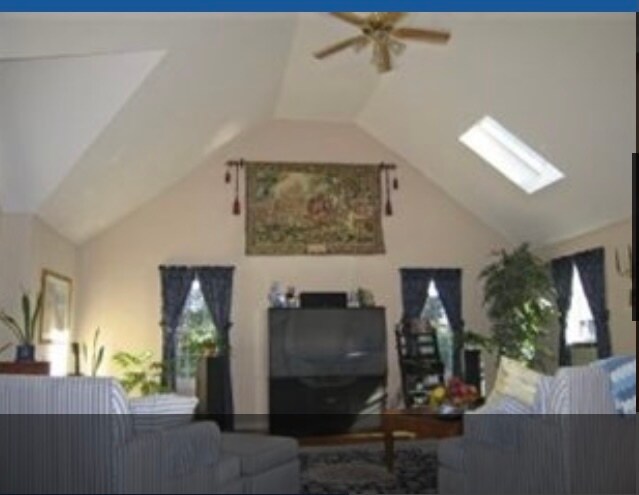 Cathedral Ceiling family room with wood stove insert - 103 Mount Lebanon St