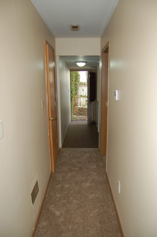 Hallway to 2BR/BR/Laundry and door to patio - 775 Beech St