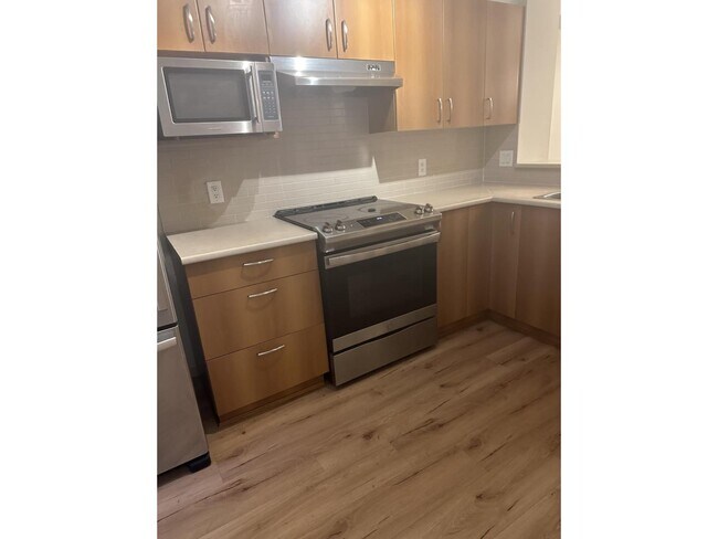 Photo du bâtiment - 103-62A 62 A Ave