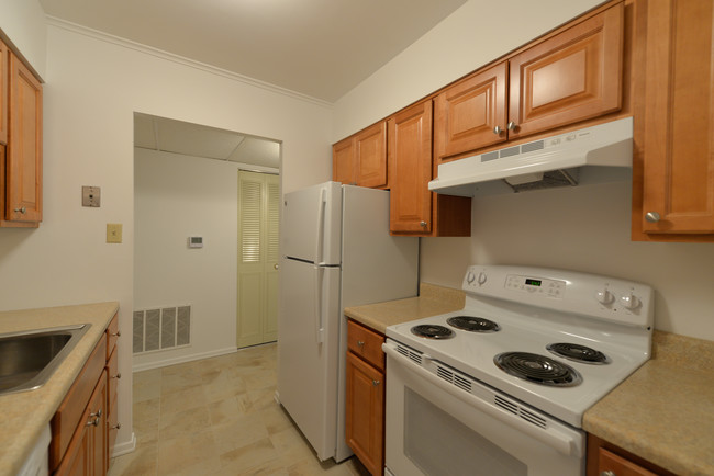 Kitchen | Hall - Maple Cabinets - Durham Court Apartments Buildings A, B & C