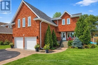 Building Photo - 1530 Scollard Crescent