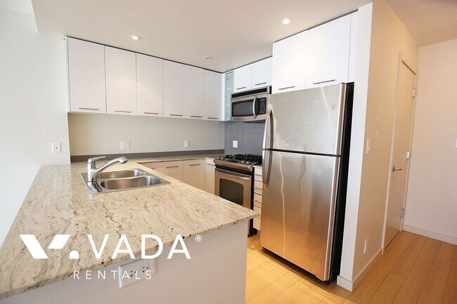 Photo du bâtiment - Wall Centre 1 Bedroom Apartment For Rent 703-3111 Corvette Way Richmond: VADAPM.com