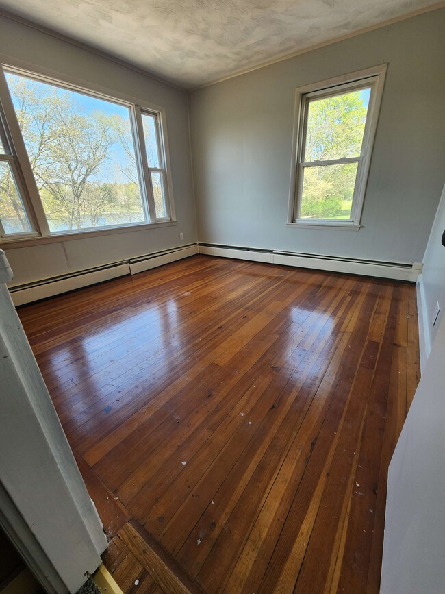 Masterbed Wood Floor - 1164 Lonsdale Ave