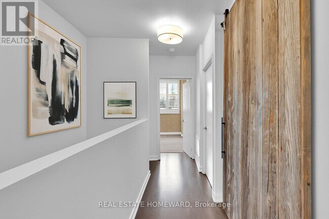 Building Photo - 201-201 Carlaw Ave