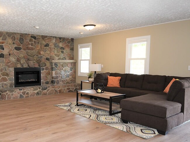 Lounge Area with Fireplace! - Tourville Apartments