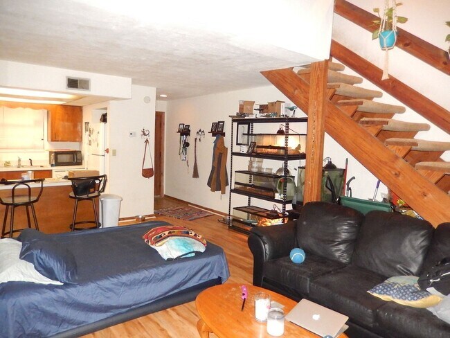 Building Photo - SPACIOUS 1/1 with Deck, Plank Floors, Vaul...