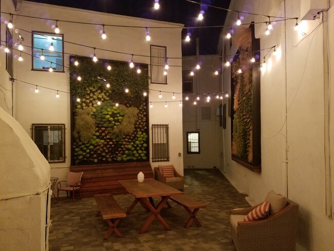 Courtyard at night - 851 Sanborn Ave