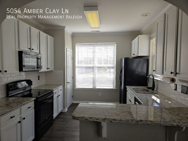 Foto del edificio - 5054 Amber Clay Ln