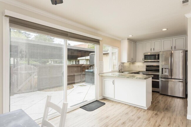 Building Photo - 8749 Woodman Way