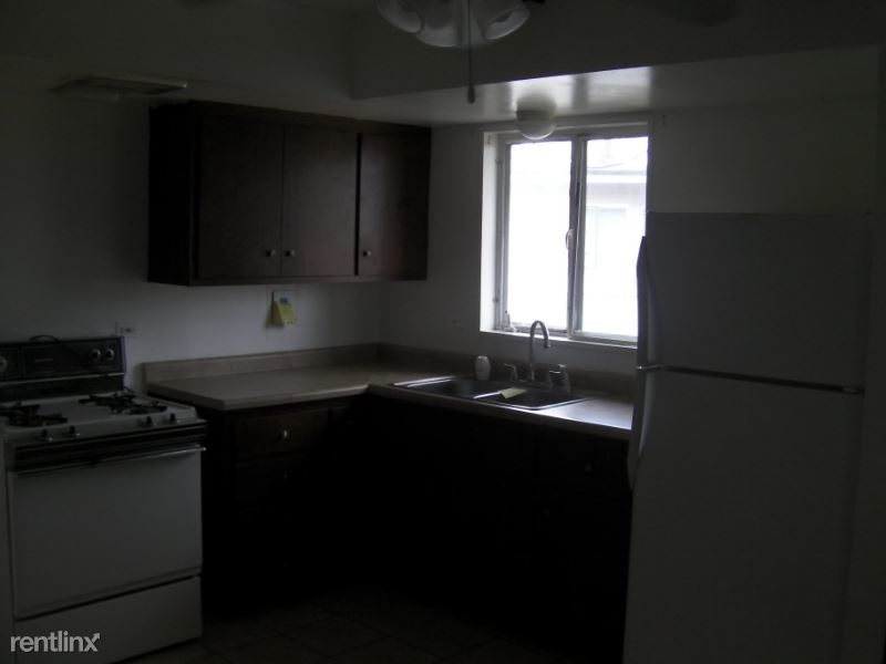 Building Photo - 3 br, 1.5 bath House - 4 East Rocket