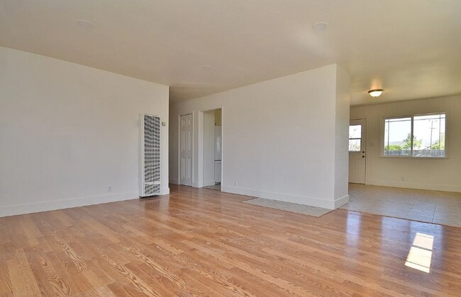 Building Photo - Spacious Gated House with Huge Yard for Re...